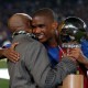 Barcelona's Samuel Eto'o recieves his African Footballer of the Year Award from his father before the game against Real Mallorca